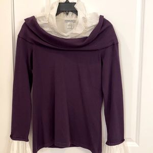 Combination ruffle blouse and sweater.
